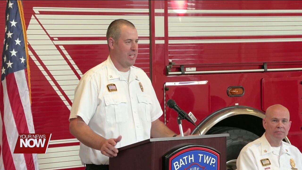 Bath Township Fire Chief, Joe Kitchen, swears in Brock Yingling as Platoon Chief along with Nine new firefighters
